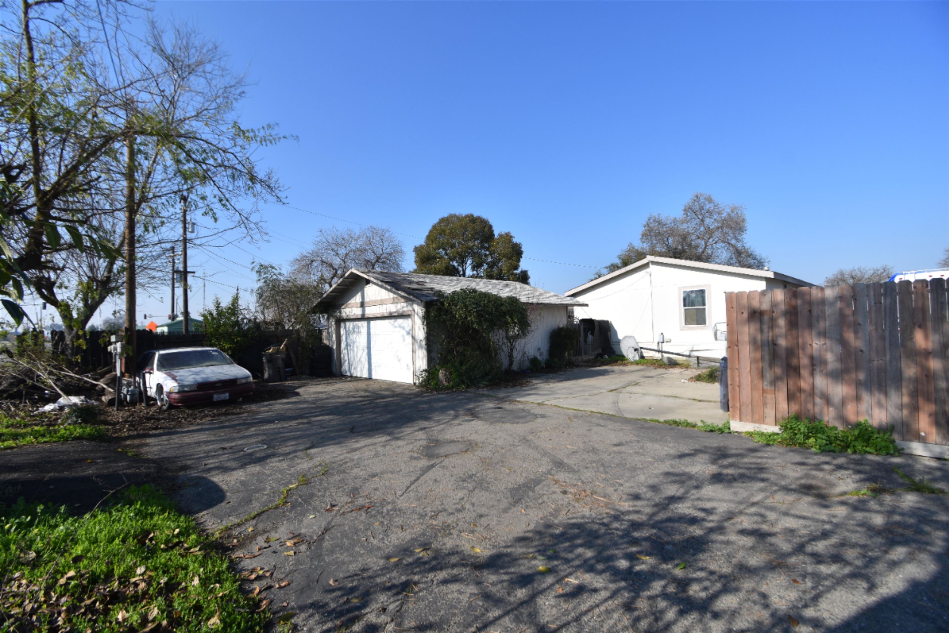 4049 Farmington Road Stockton, CA 95215 - Photo 3 of 10 a view of a house with a yard