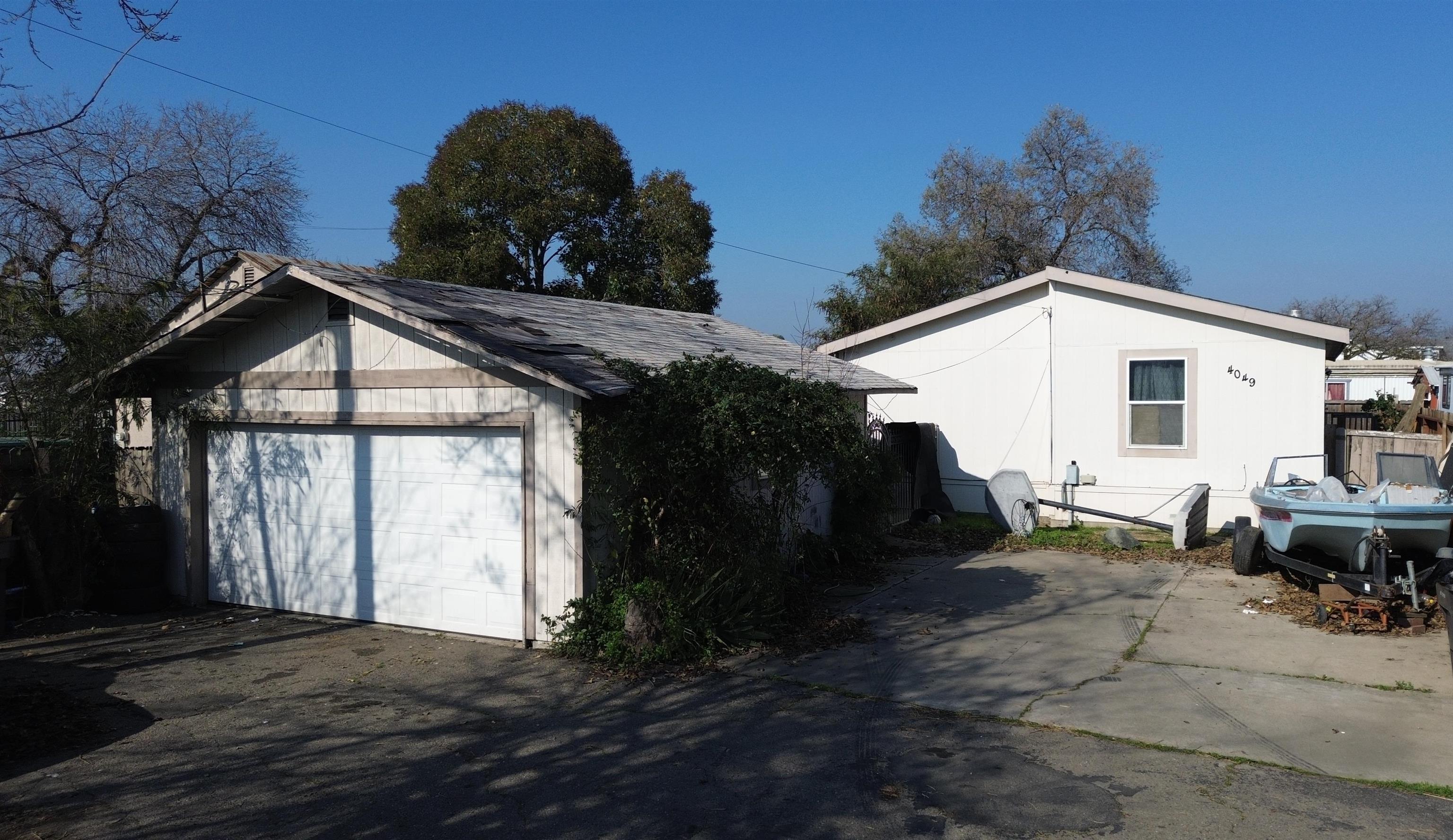 4049 Farmington Road Stockton, CA 95215 - Photo 10 of 10 a backyard of a house with table and chairs