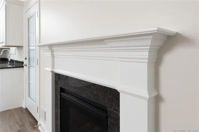 a close view of a fireplace and utility room