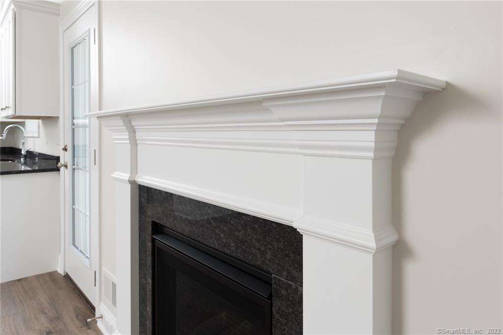 29 Covey Road, Unit 13 Burlington, CT 06013 - Photo 12 of 34 a close view of a fireplace and utility room