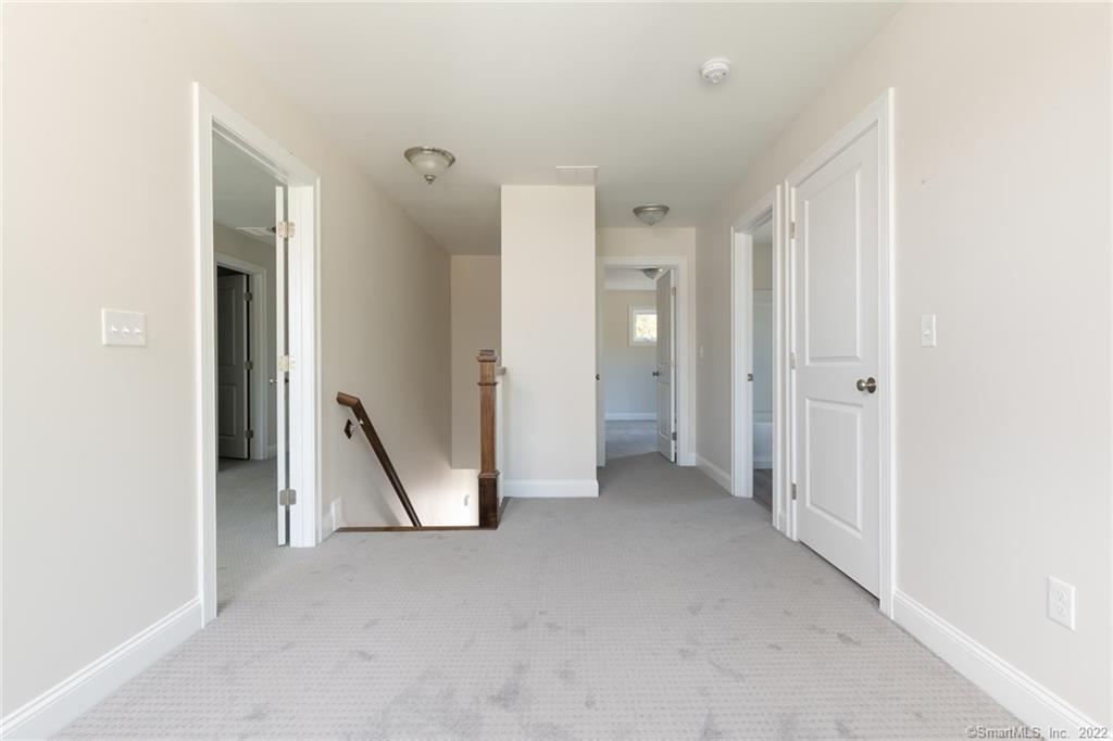 29 Covey Road, Unit 13 Burlington, CT 06013 - Photo 22 of 34 a view of a room with white walls