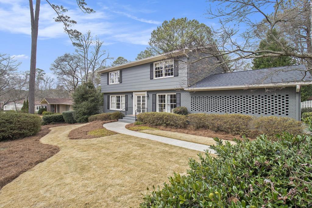 1463 Altamont Drive Decatur, GA 30033 - Photo 1 of 1 a front view of a house with a yard