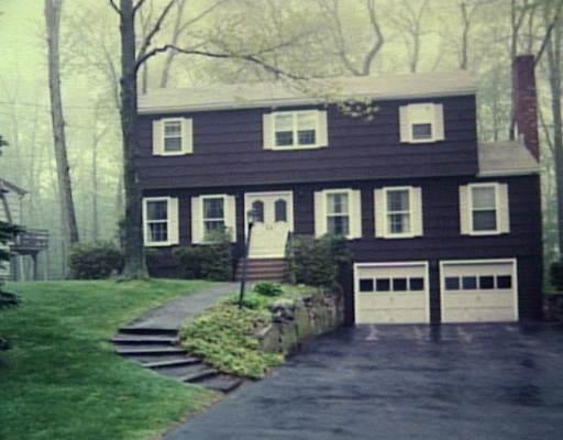 15 Salem Road Trumbull, CT 06611 - Photo 1 of 1 a view of a brick building next to a yard