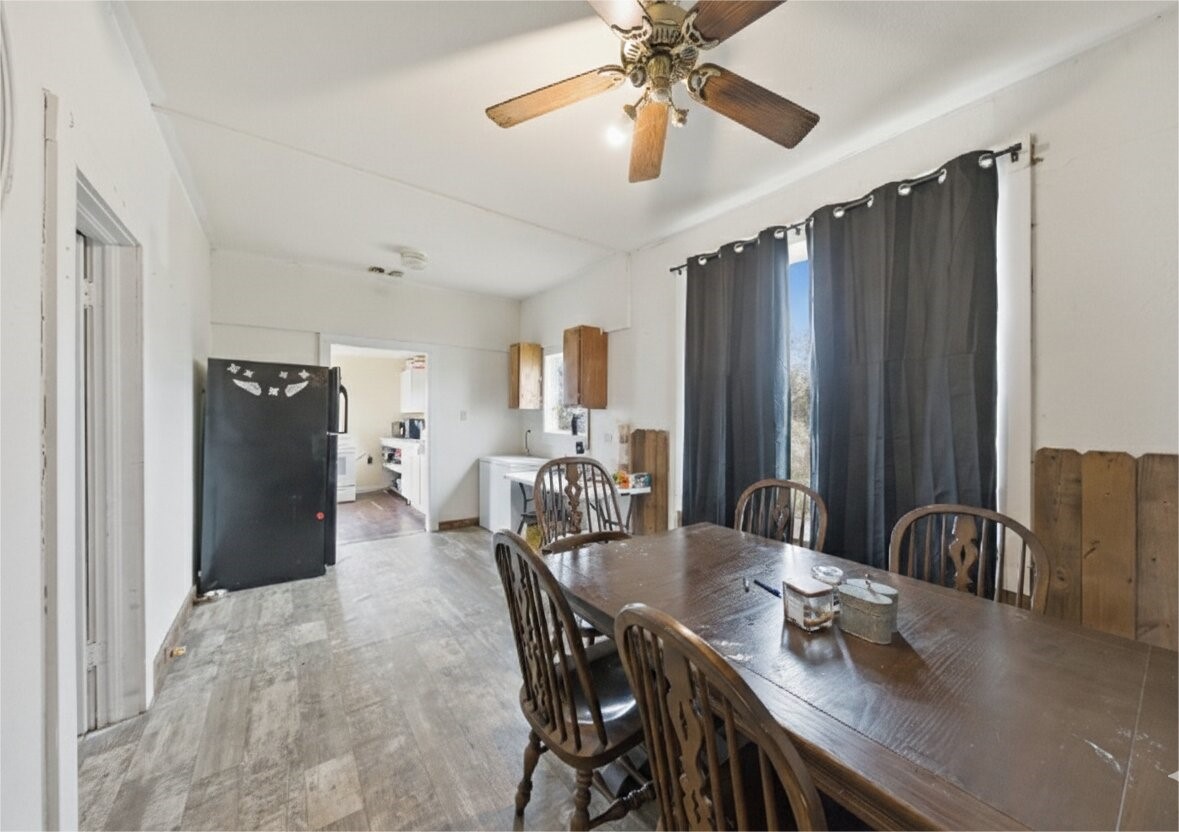 17714 Day Road Needville, TX 77461 - Photo 13 of 22 a dining room with furniture and window