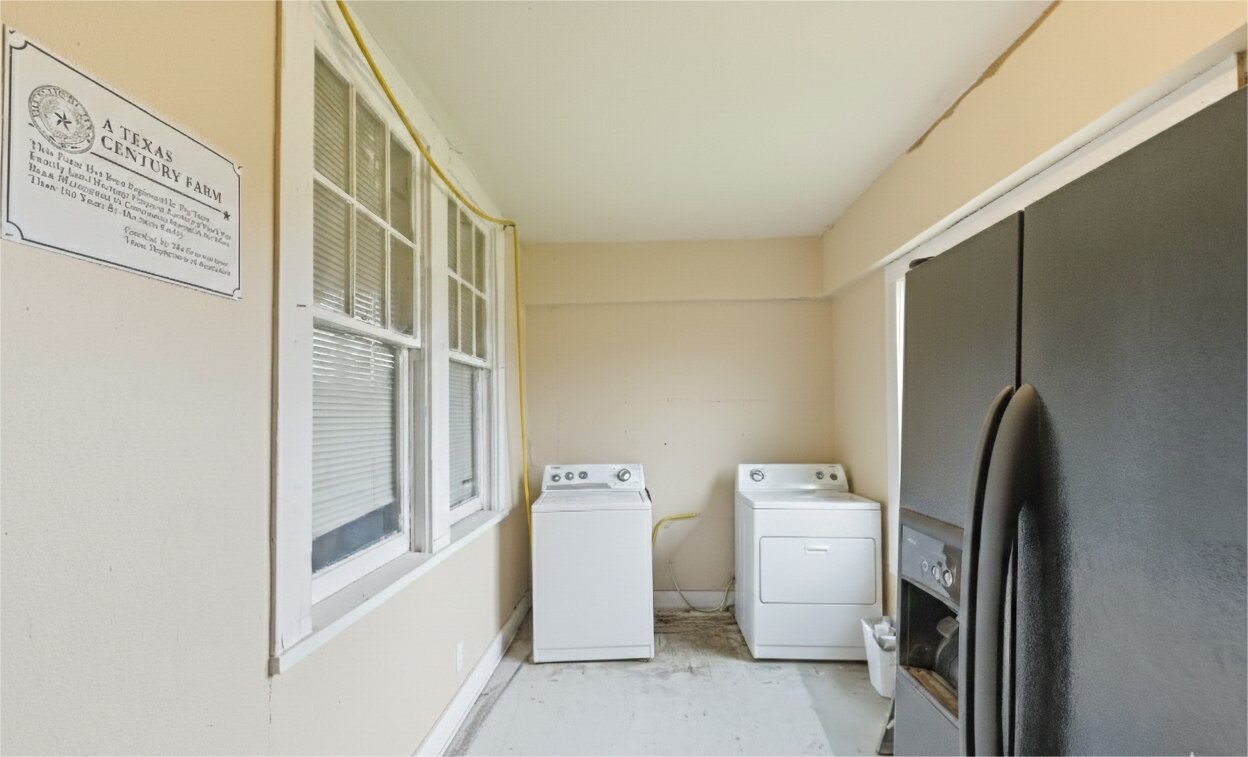 17714 Day Road Needville, TX 77461 - Photo 19 of 22 a view of walk in closet with clothes and shoes