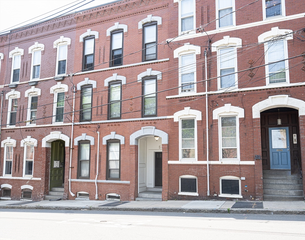 54 Beacon Street, Unit 2 Chelsea, MA 02150 - Photo 24 of 26 a front view of a multi story residential apartment building