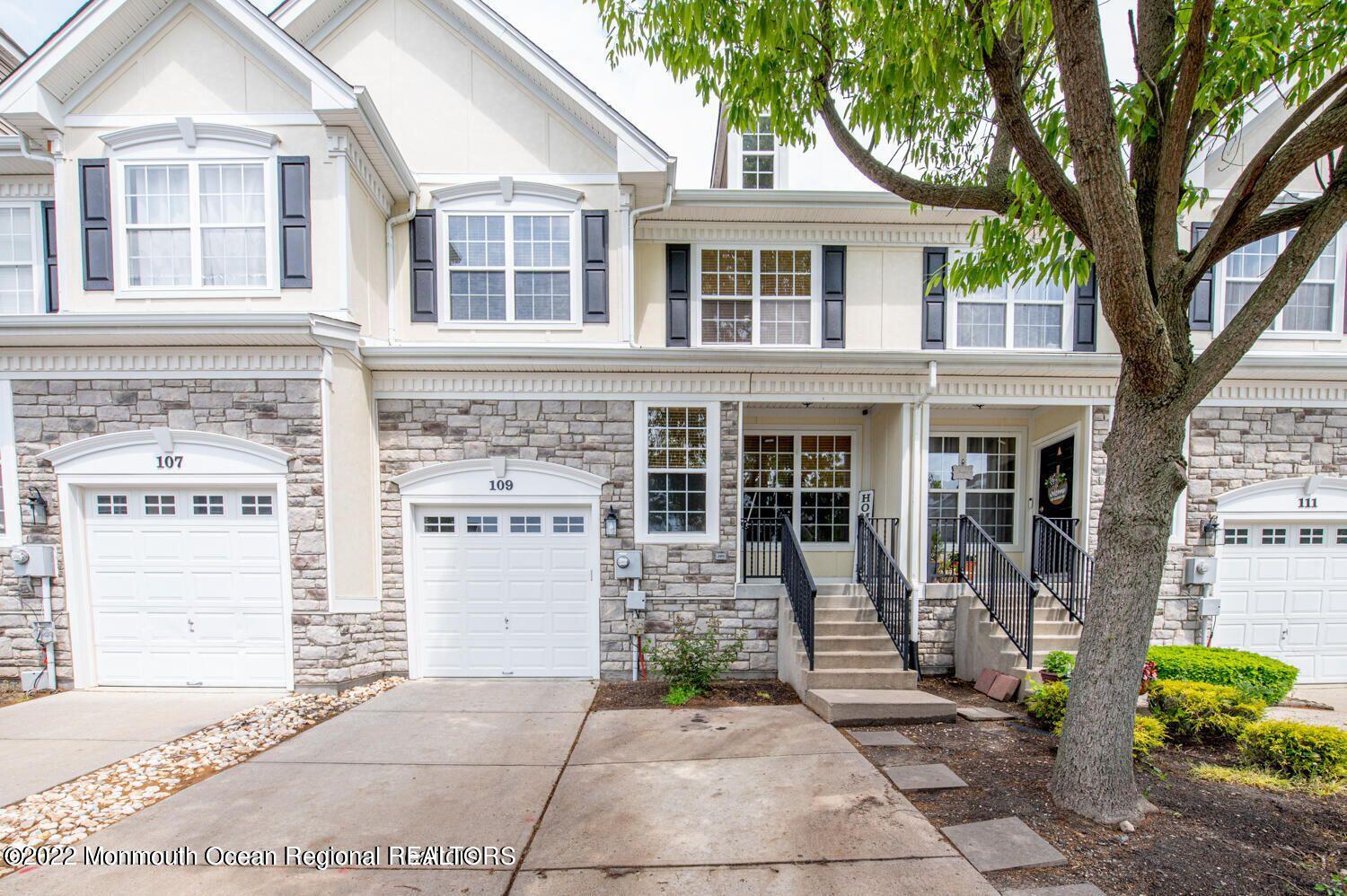 109 Brookfield Drive Jackson, NJ 08527 - Photo 1 of 40 front view of a brick house with a large windows
