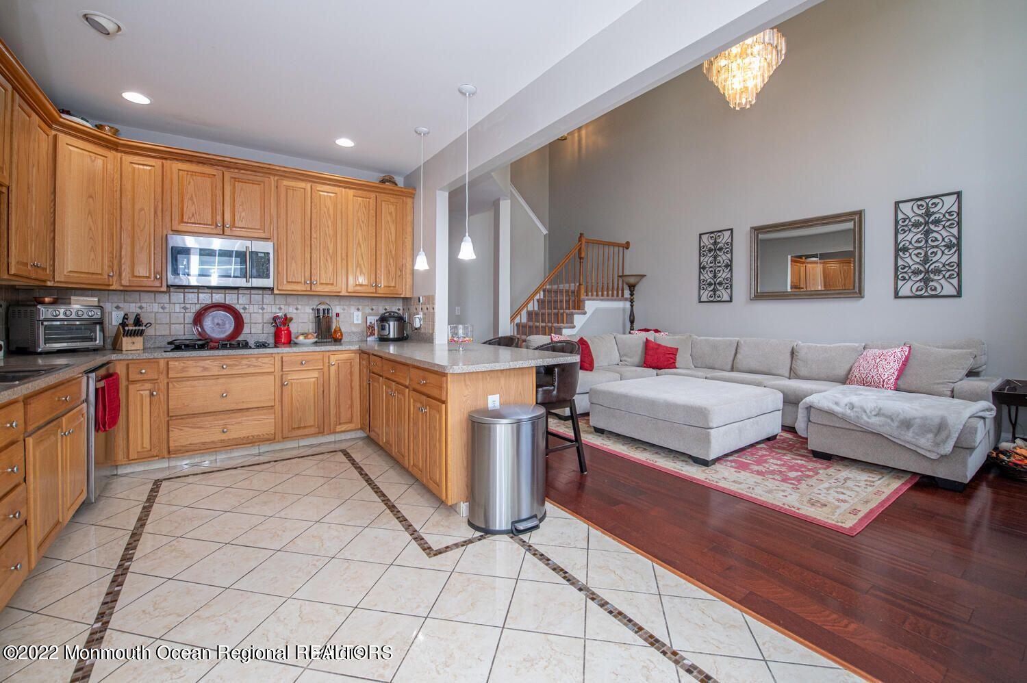 109 Brookfield Drive Jackson, NJ 08527 - Photo 16 of 40 a kitchen with a sink cabinets and window