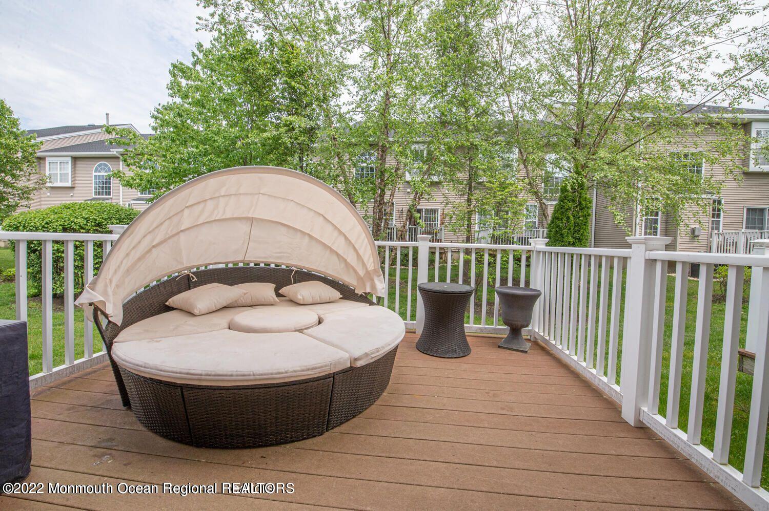 109 Brookfield Drive Jackson, NJ 08527 - Photo 21 of 40 a view of a two chair in the balcony