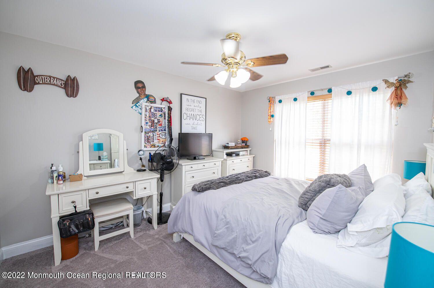 109 Brookfield Drive Jackson, NJ 08527 - Photo 29 of 40 a bedroom with a bed furniture and a window