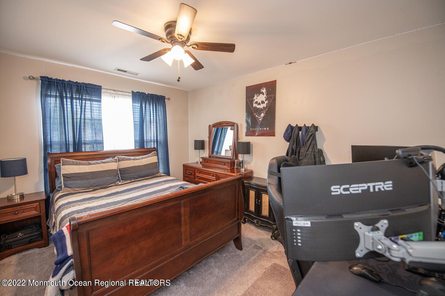 109 Brookfield Drive Jackson, NJ 08527 - Photo 30 of 40 a view of workspace with furniture and ceiling fan
