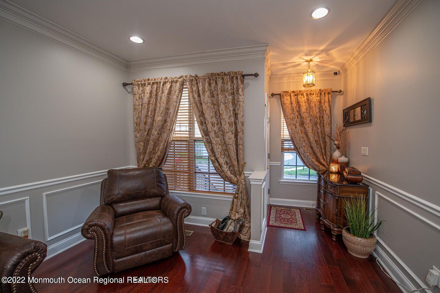 109 Brookfield Drive Jackson, NJ 08527 - Photo 5 of 40 a living room with furniture and a wooden floor