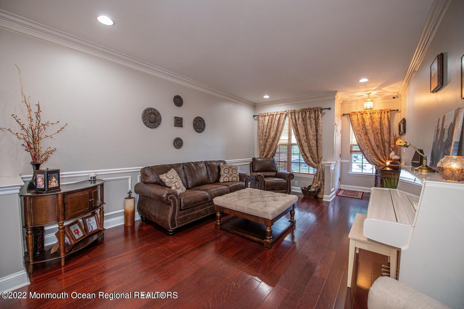 109 Brookfield Drive Jackson, NJ 08527 - Photo 6 of 40 a living room with furniture and a wooden floor
