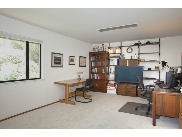 175 Ridgeway Road Hillsborough, CA 94010 - Photo 18 of 23 a room with furniture a air conditioner and a window