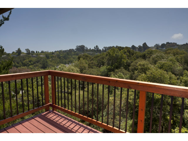 175 Ridgeway Road Hillsborough, CA 94010 - Photo 23 of 23 a view of balcony with wooden floor and fence