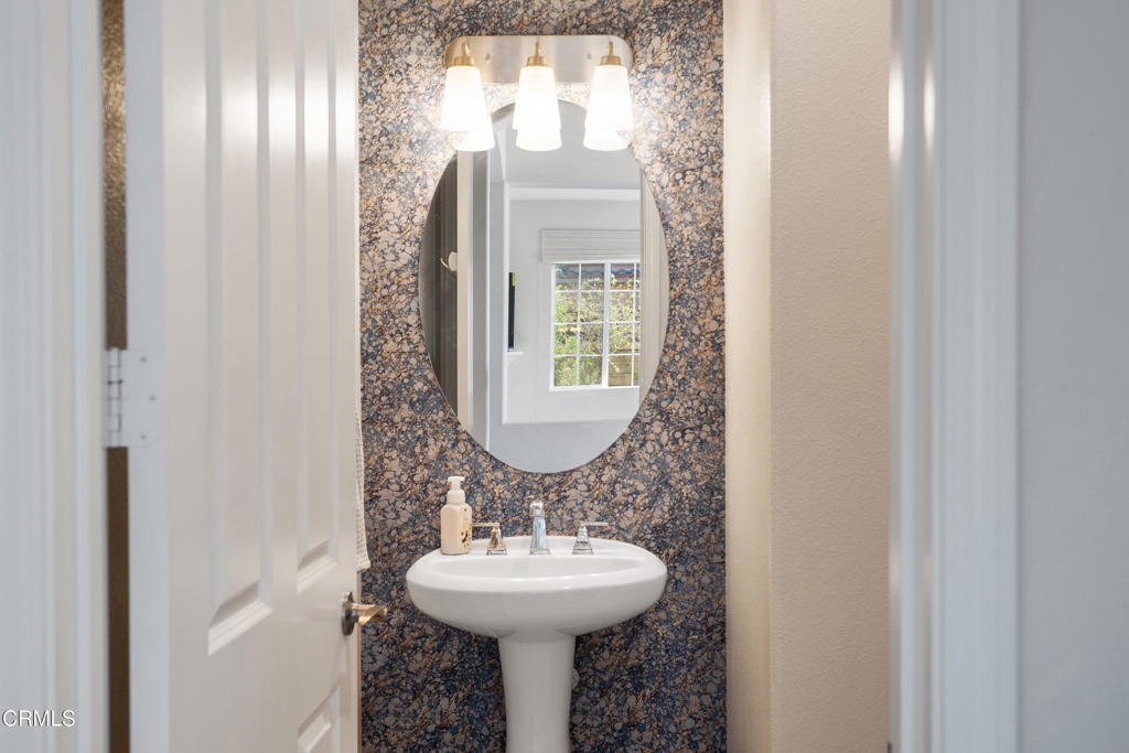 1655 Range Road Oxnard, CA 93036 - Photo 16 of 34 a bathroom with a sink and mirror