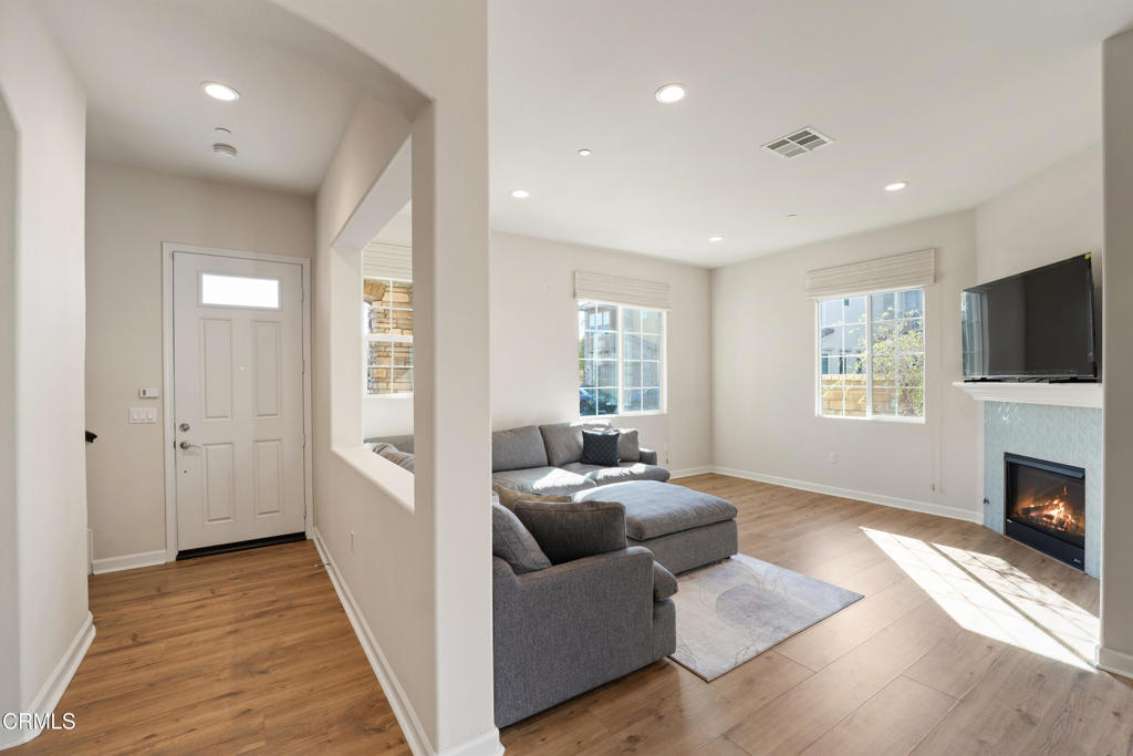 1655 Range Road Oxnard, CA 93036 - Photo 5 of 34 a living room with furniture and a fireplace