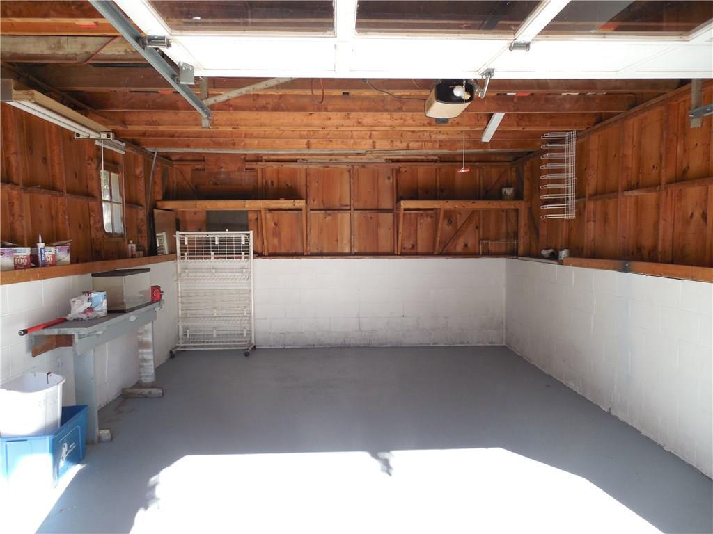 131 Dummer Street Bath, ME 04530 - Photo 18 of 32 Storage along back of garage wall