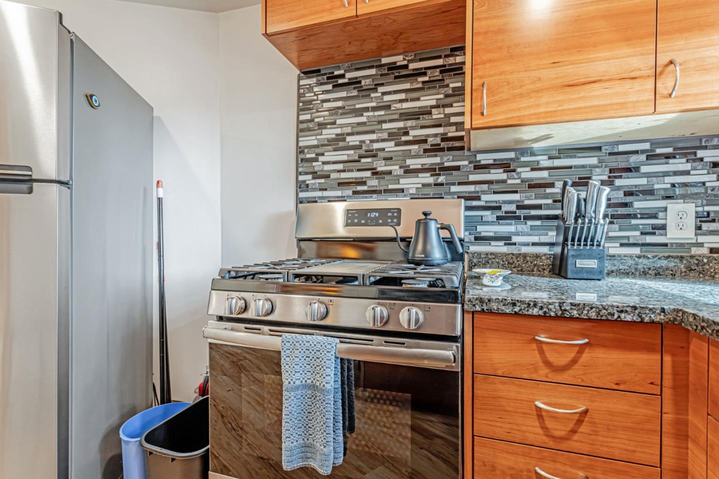12845 Love Creek Road Ben Lomond, CA 95005 - Photo 24 of 61 a stove top oven sitting inside of a kitchen