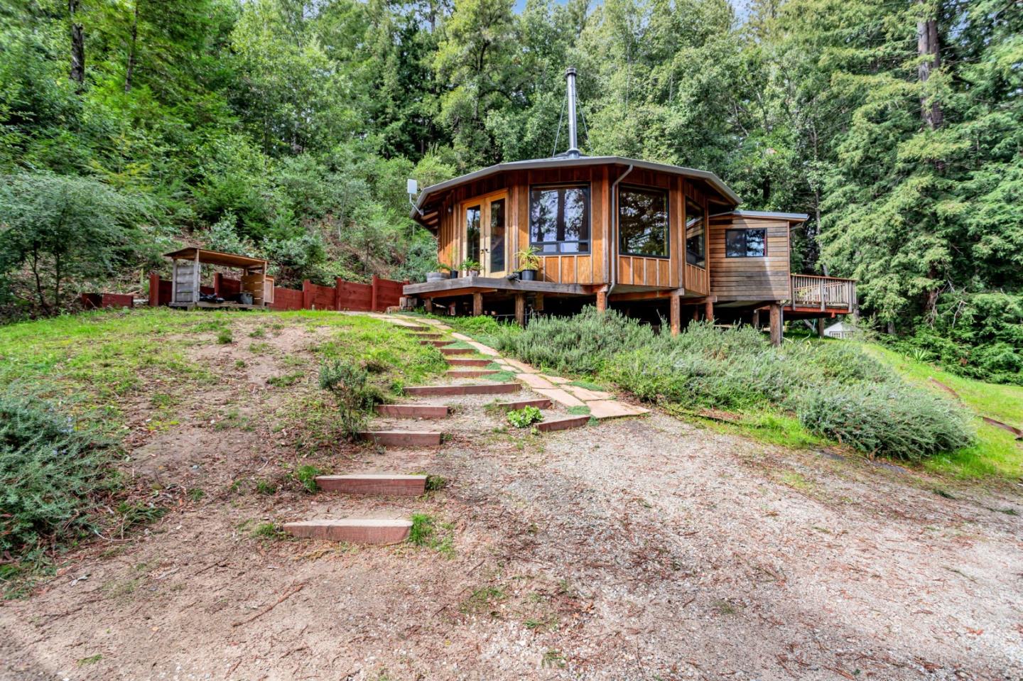 12845 Love Creek Road Ben Lomond, CA 95005 - Photo 34 of 61 a view of a house with a yard