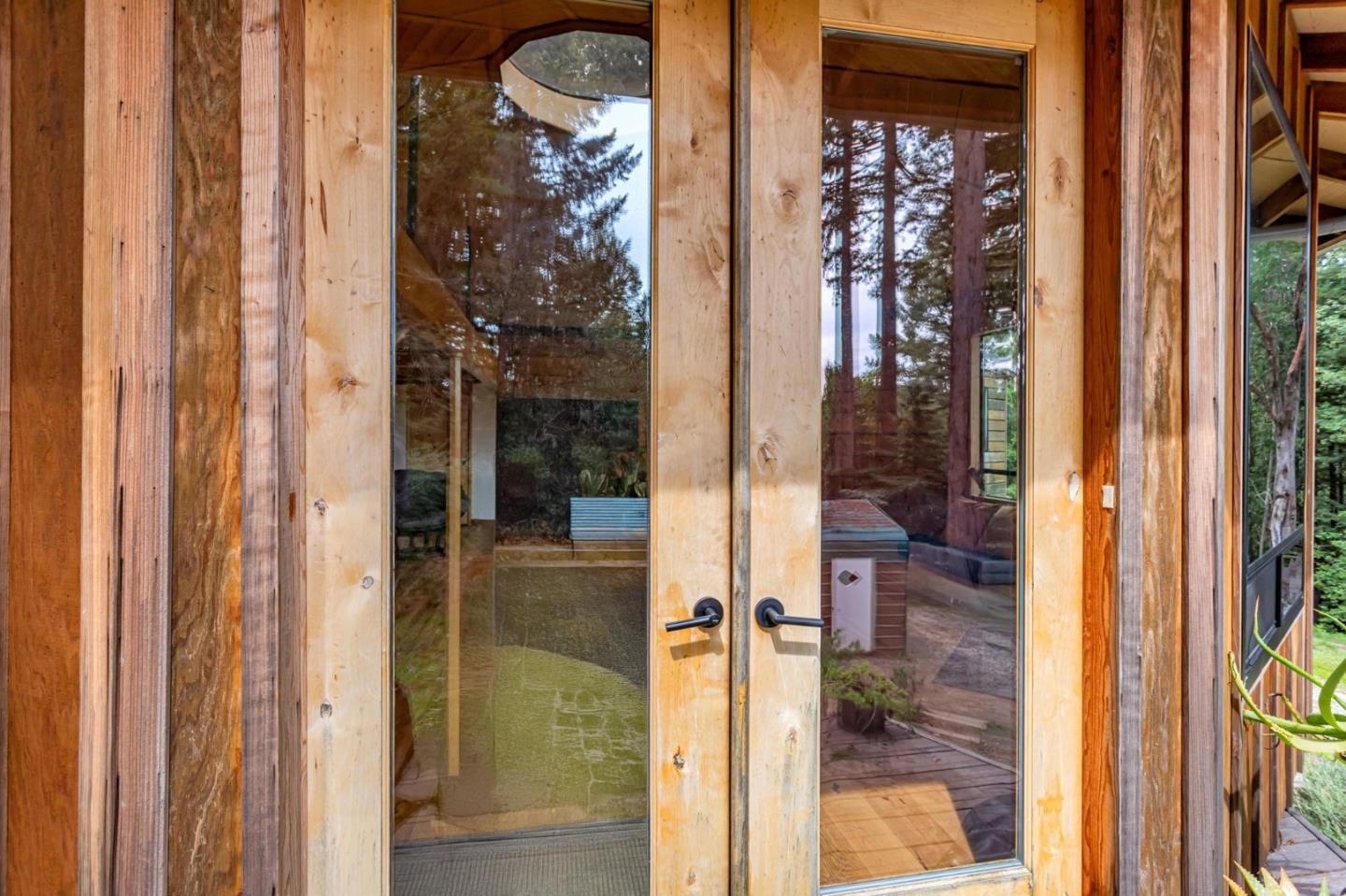 12845 Love Creek Road Ben Lomond, CA 95005 - Photo 37 of 61 a bathroom with a glass door and shower