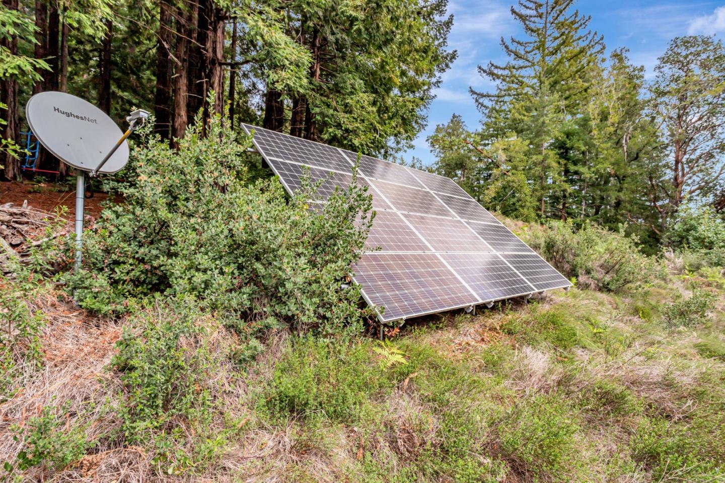 12845 Love Creek Road Ben Lomond, CA 95005 - Photo 56 of 61 a view of a backyard with table and chairs and wooden fence