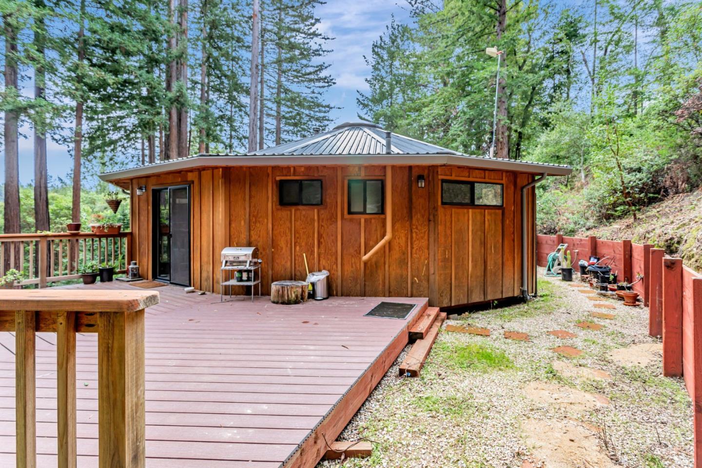 12845 Love Creek Road Ben Lomond, CA 95005 - Photo 7 of 61 a view of a house with a patio