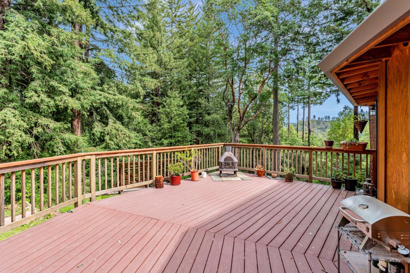 12845 Love Creek Road Ben Lomond, CA 95005 - Photo 10 of 61 a view of balcony with wooden floor and outdoor seating