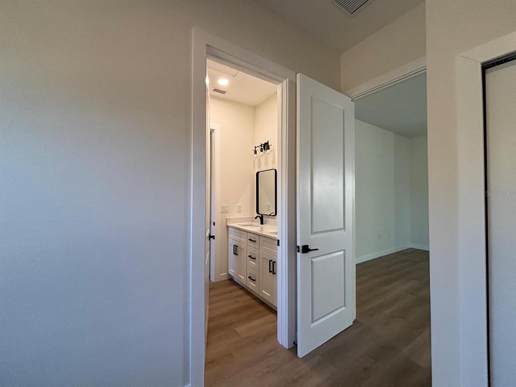 15215 Southwest 43rd Court Ocala, FL 34473 - Photo 8 of 29 an empty room with mirror