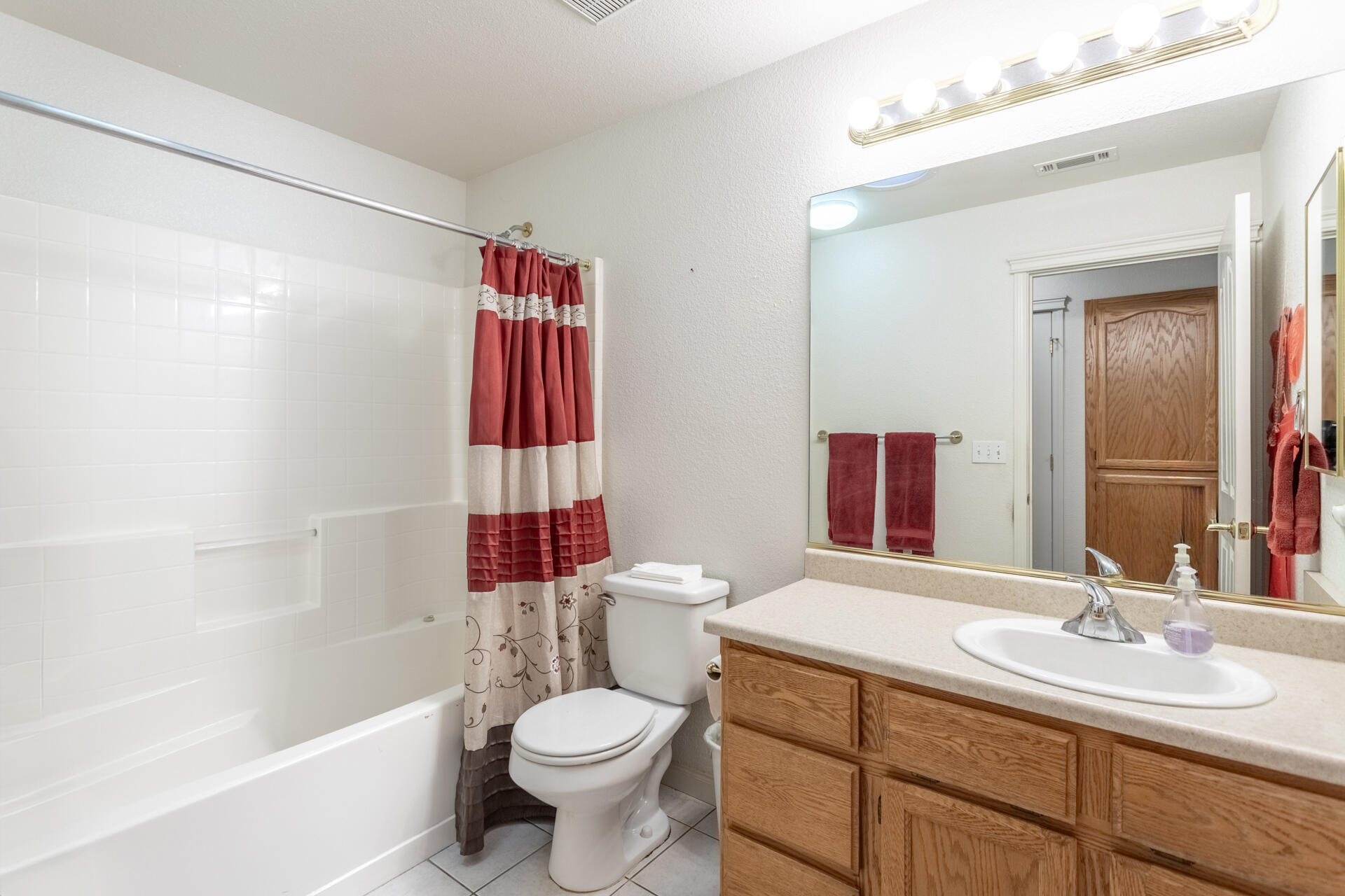 1343 Britt Lane Red Bluff, CA 96080 - Photo 11 of 17 a bathroom with a sink toilet and shower