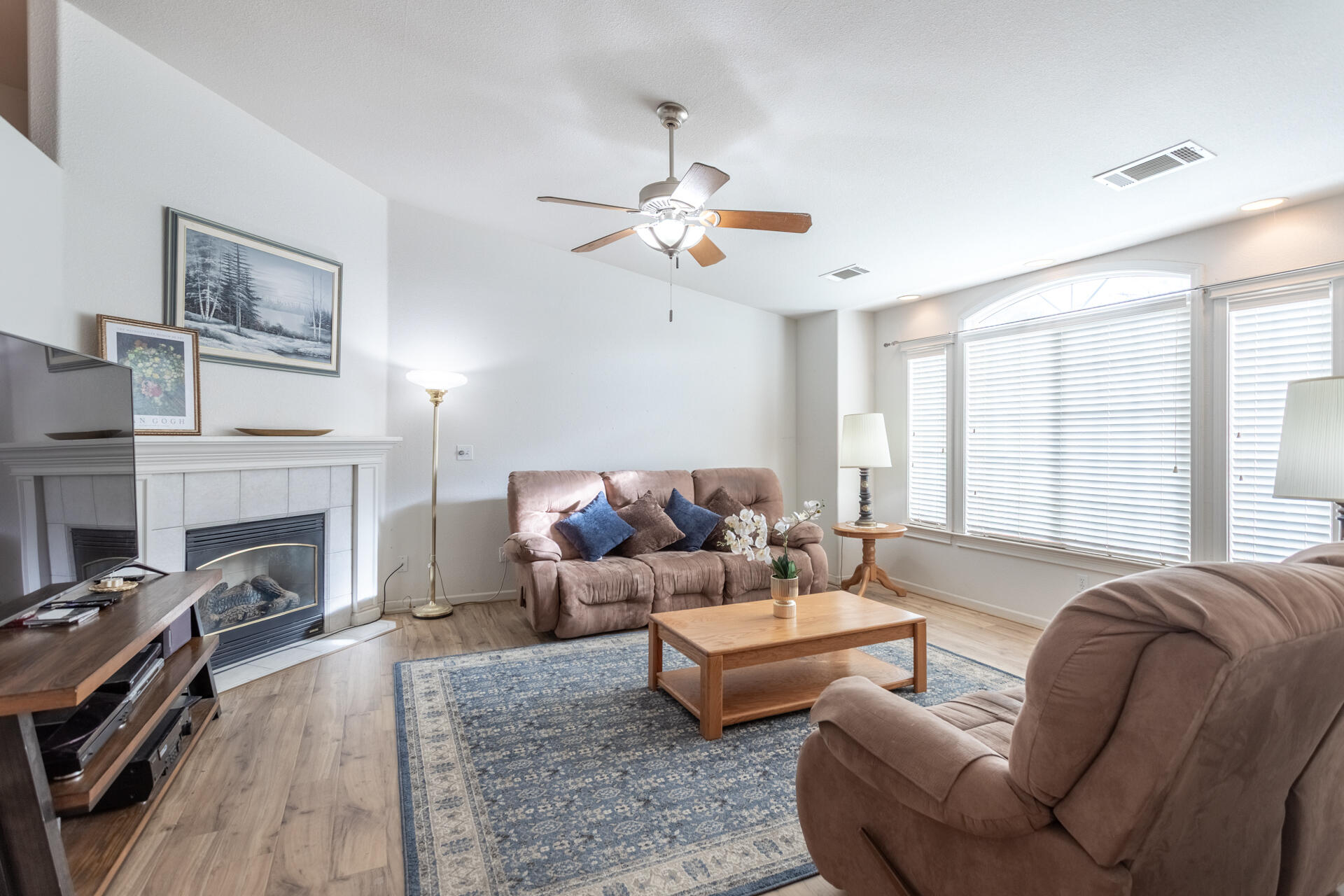 1343 Britt Lane Red Bluff, CA 96080 - Photo 3 of 17 a living room with furniture fireplace and a large window