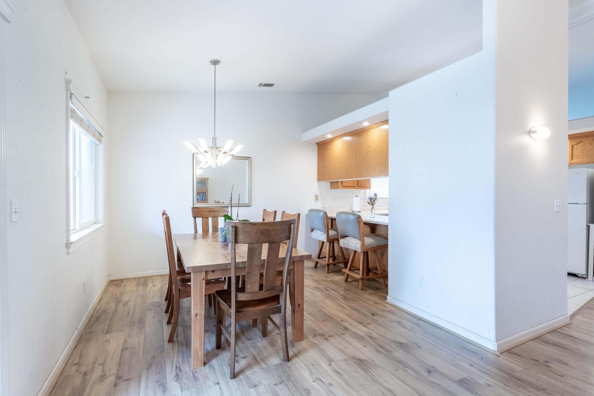 1343 Britt Lane Red Bluff, CA 96080 - Photo 5 of 17 a view of a dining room with furniture and wooden floor