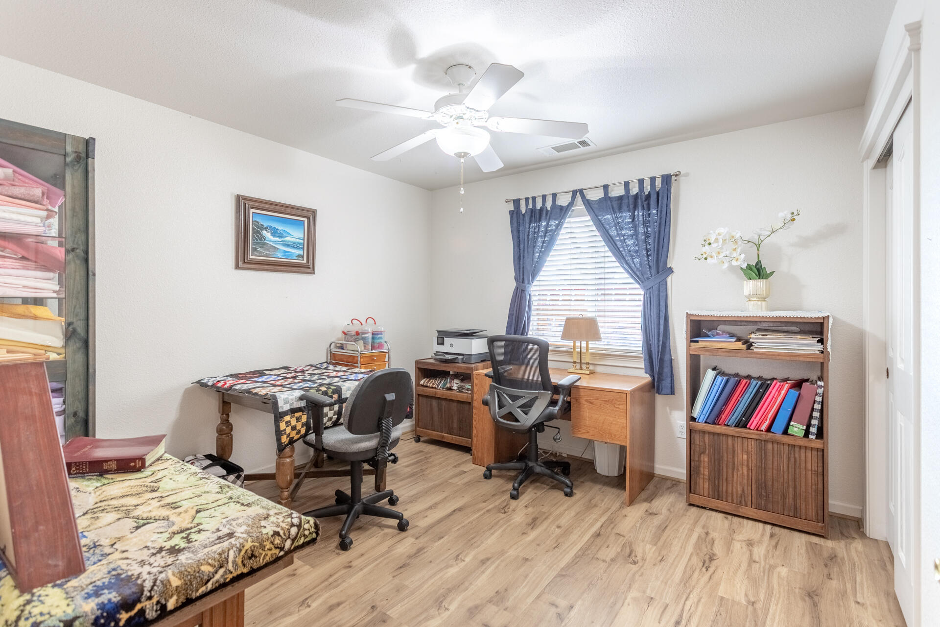 1343 Britt Lane Red Bluff, CA 96080 - Photo 10 of 17 a view of a workspace with furniture and a workspace