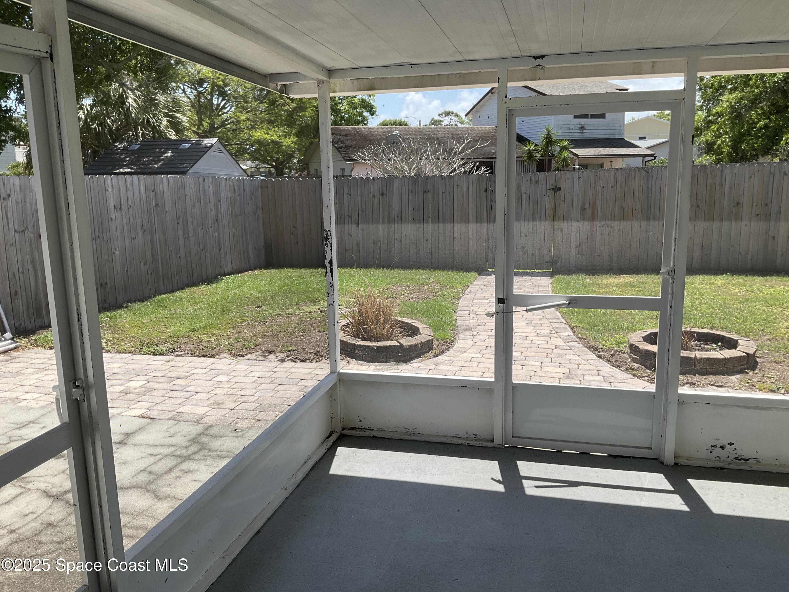 1668 Clover Circle Melbourne, FL 32935 - Photo 16 of 16 a view of outdoor space with backyard