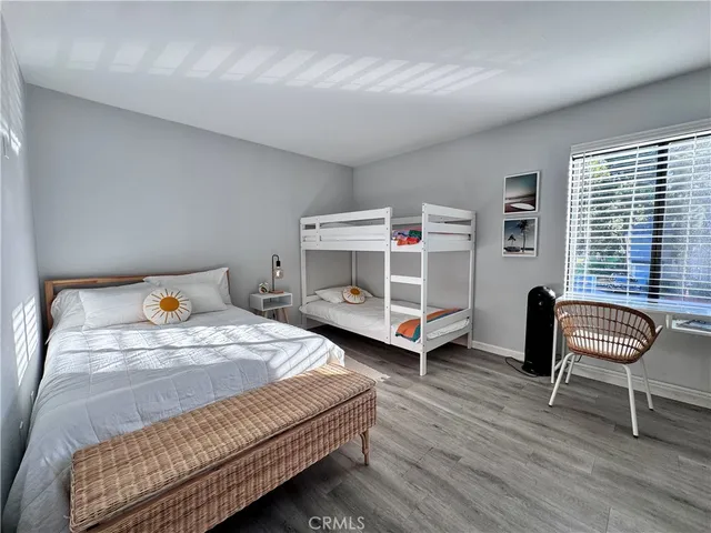 a view of a kitchen with chairs and stairs