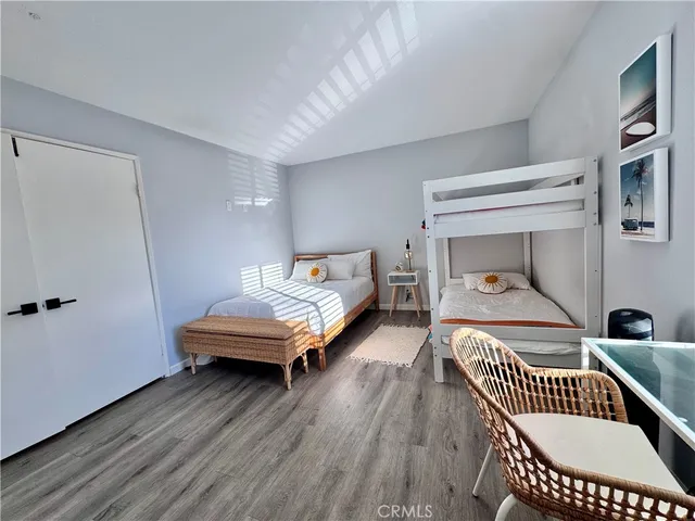 a bathroom with a toilet a sink and a mirror