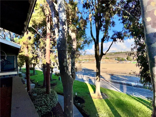 a view of swimming pool from a balcony