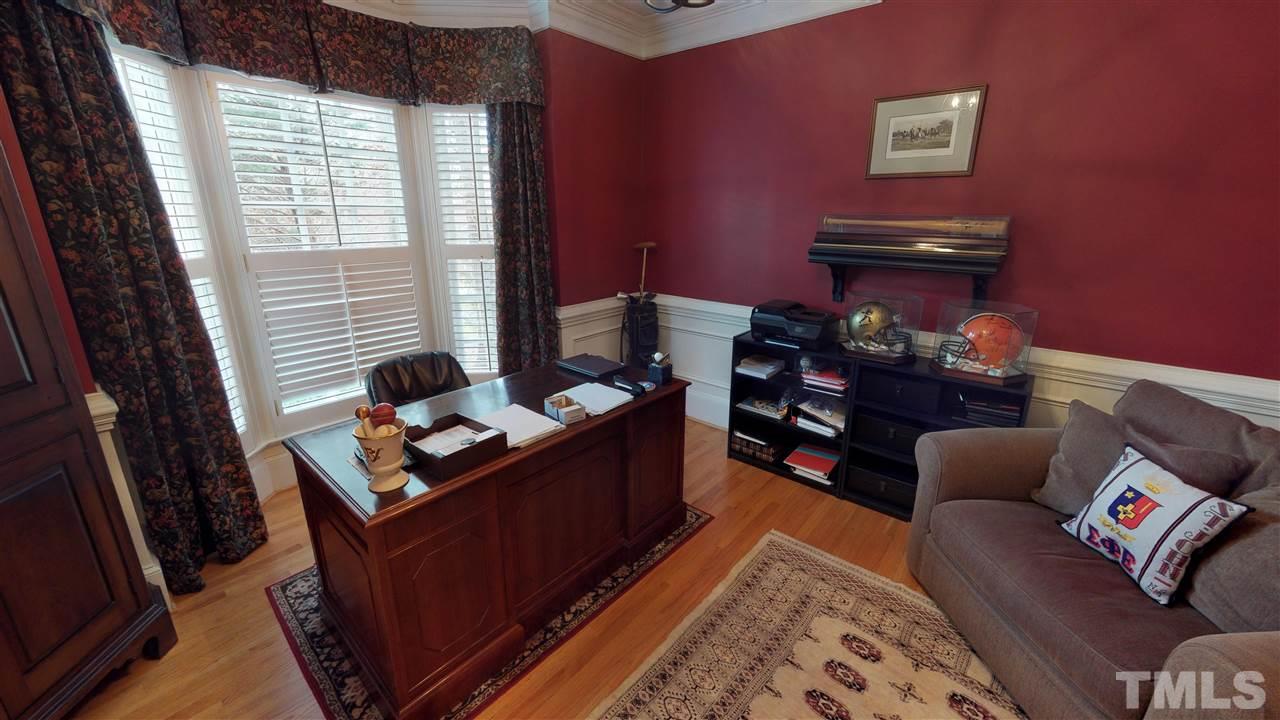 11208 Brass Kettle Road Raleigh, NC 27614 - Photo 3 of 25 a work room with furniture and a window