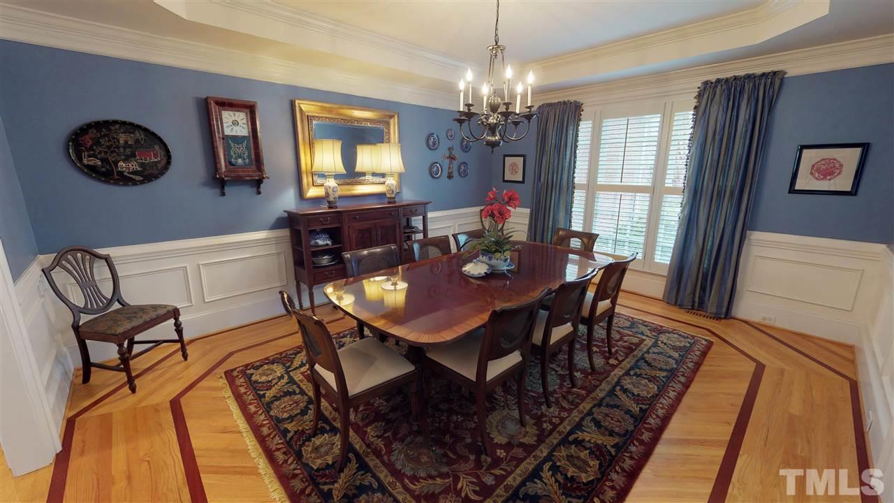 11208 Brass Kettle Road Raleigh, NC 27614 - Photo 5 of 25 a view of a dining room with furniture window and wooden floor