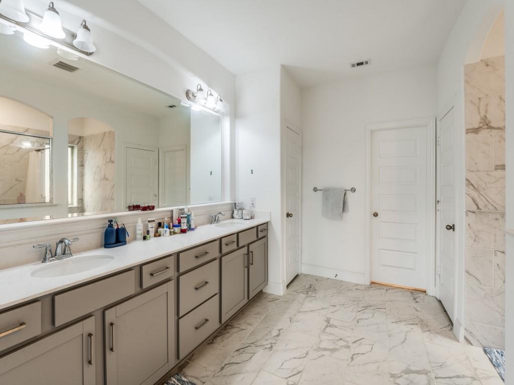 3120 Stonelake Ridge Lewisville, TX 75010 - Photo 12 of 17 a bathroom with double sink and a mirror
