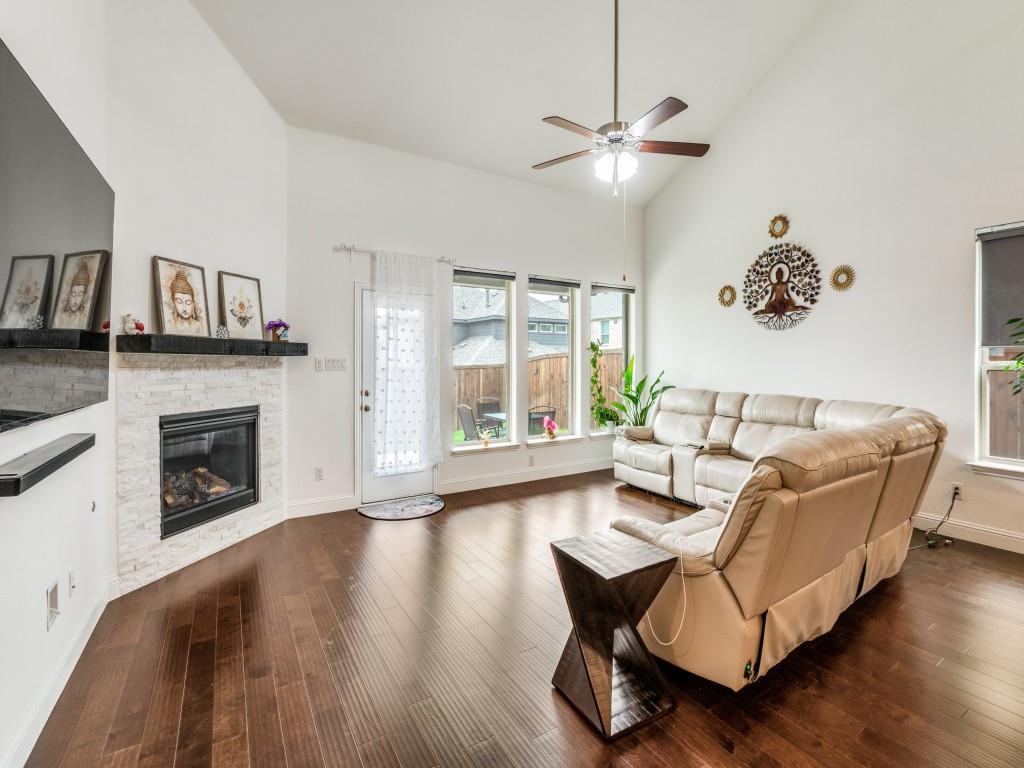 3120 Stonelake Ridge Lewisville, TX 75010 - Photo 2 of 17 a living room with furniture and a fireplace