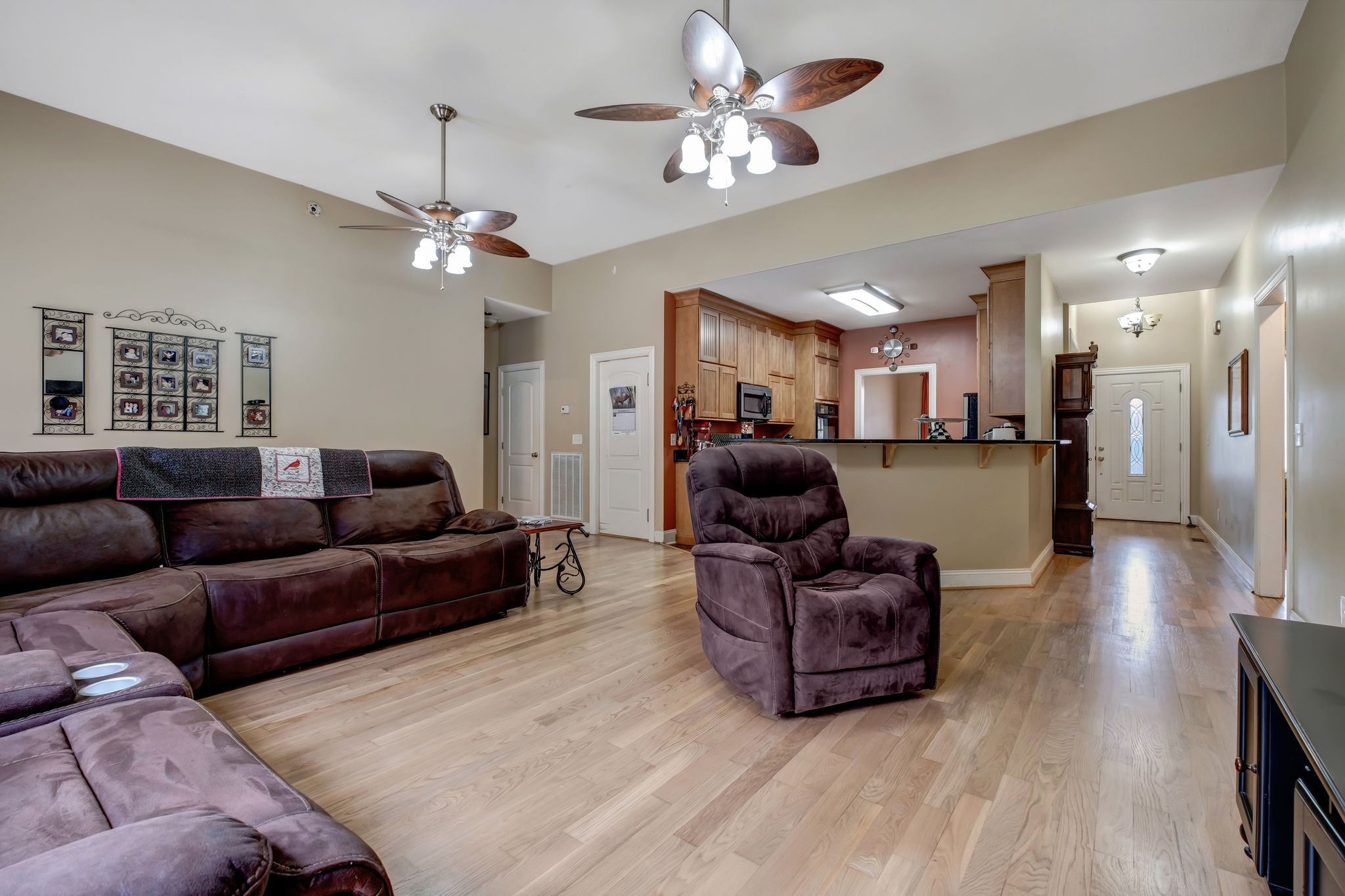 562 Dunaway Road Lebanon, TN 37090 - Photo 5 of 10 a living room with furniture kitchen view and a chandelier