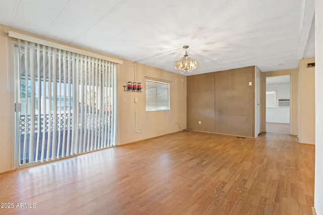 a view of an empty room with a bathroom