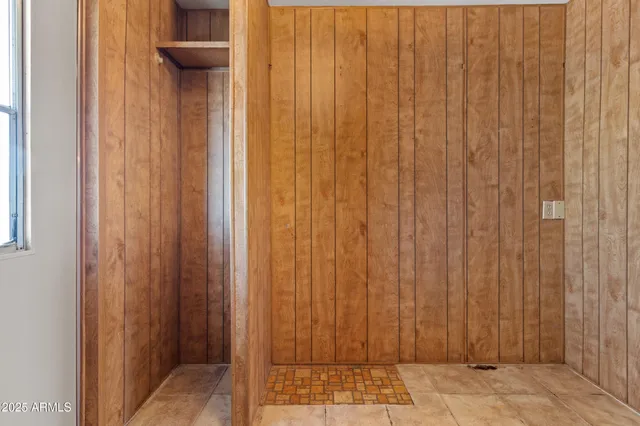a view of a bathroom with shower and a sink