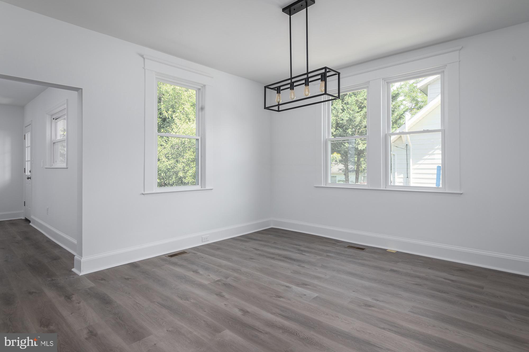 611 Plymouth Road Baltimore, MD 21229 - Photo 11 of 33 Formal Dining Room w/ Lot of Natural Light