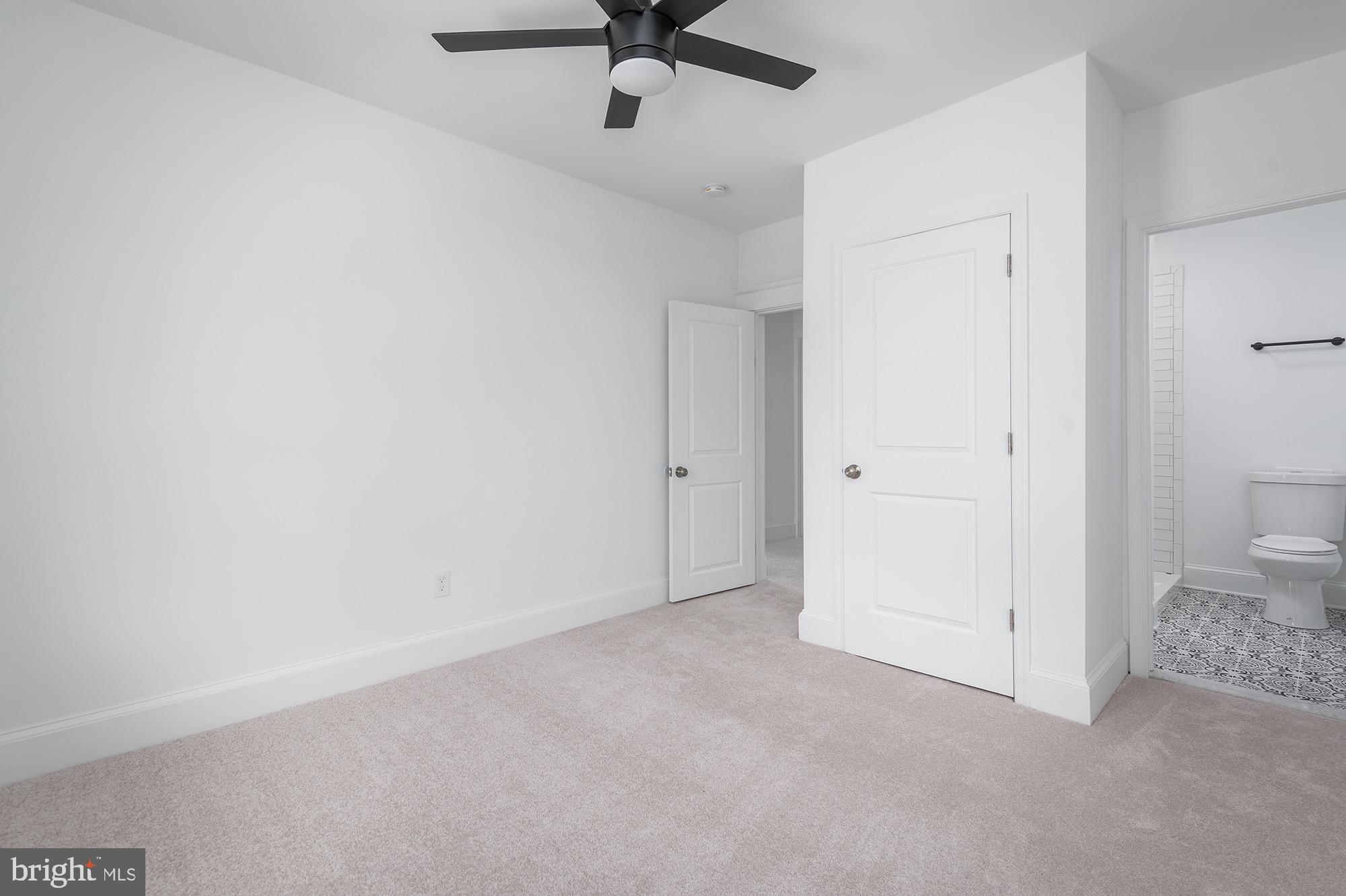 611 Plymouth Road Baltimore, MD 21229 - Photo 18 of 33 Primary Bedroom w/ Private Bathroom
