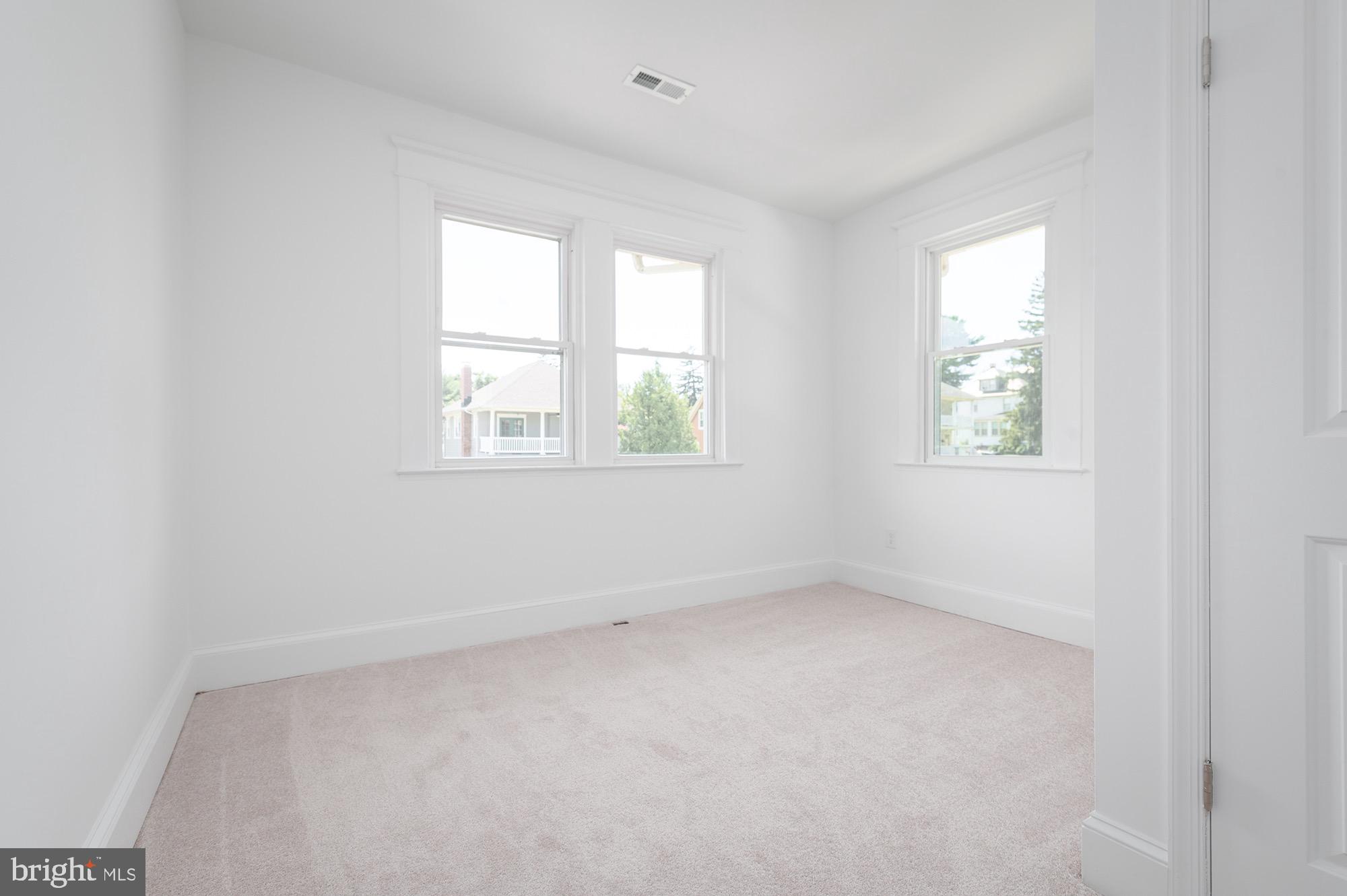 611 Plymouth Road Baltimore, MD 21229 - Photo 25 of 33 Bedroom Three w/ Fresh Paint & Carpet