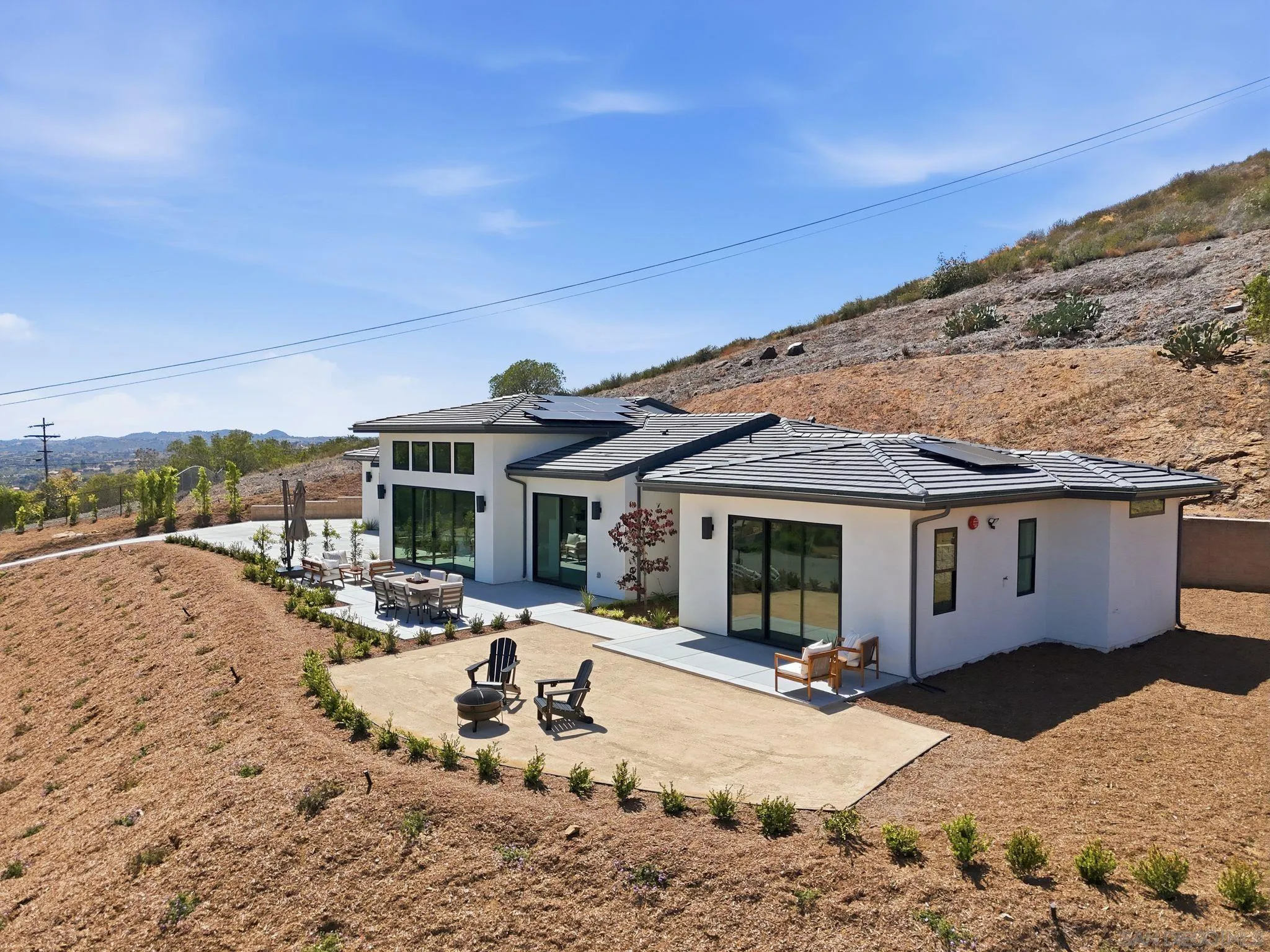 3916 Citrus Drive Fallbrook, CA 92028 - Photo 55 of 72 a view of a house with snow on the road