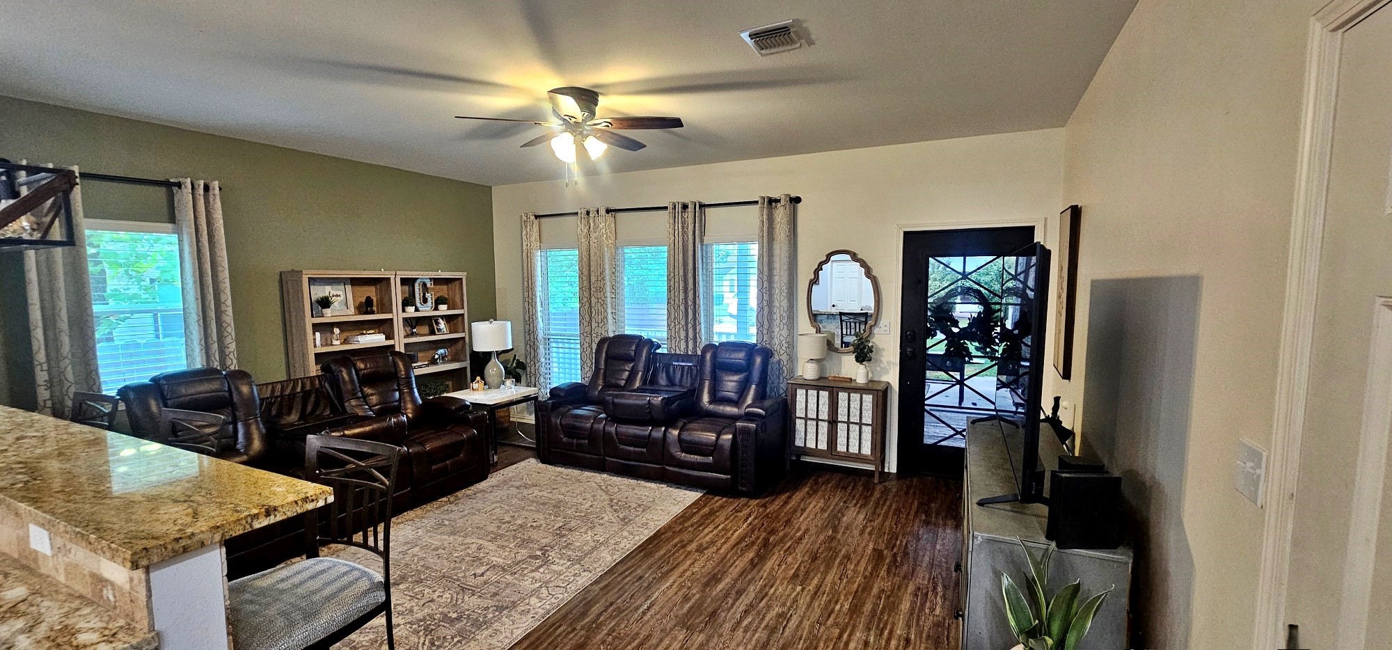 201 Smith Street Columbus, TX 78934 - Photo 4 of 20 a living room with furniture and wooden floor