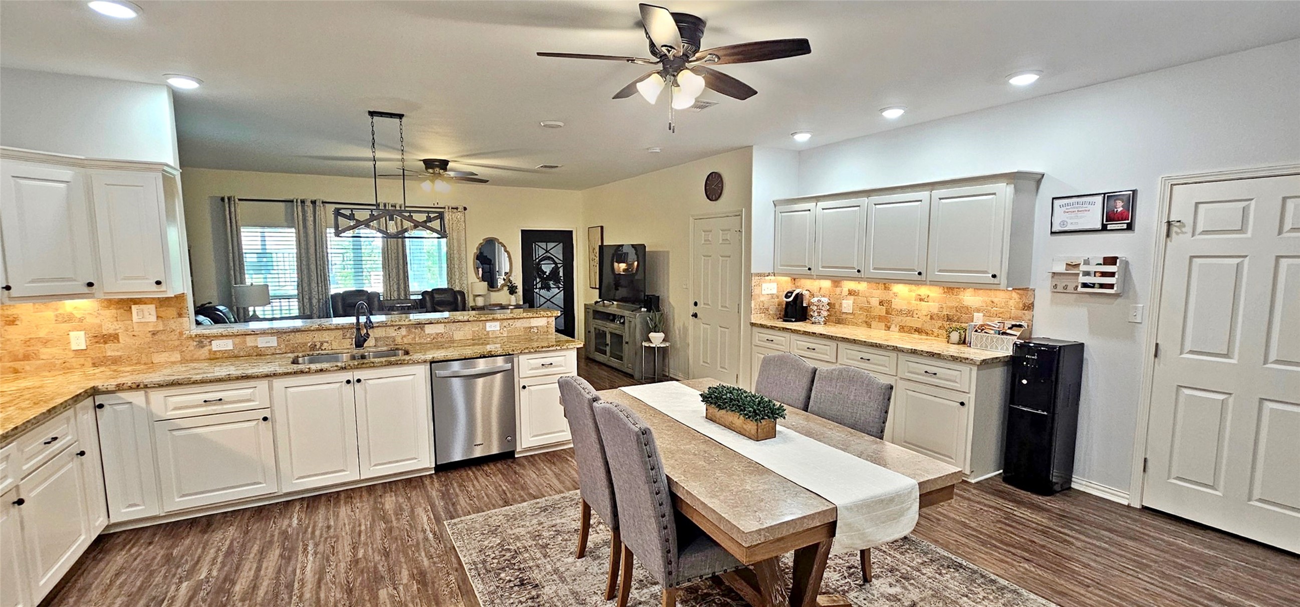 201 Smith Street Columbus, TX 78934 - Photo 5 of 20 a large kitchen with a table and chairs